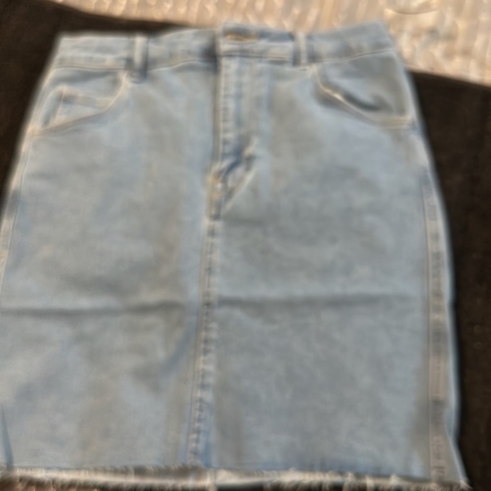 Cute H & M blue Jean skirt with cut hemline